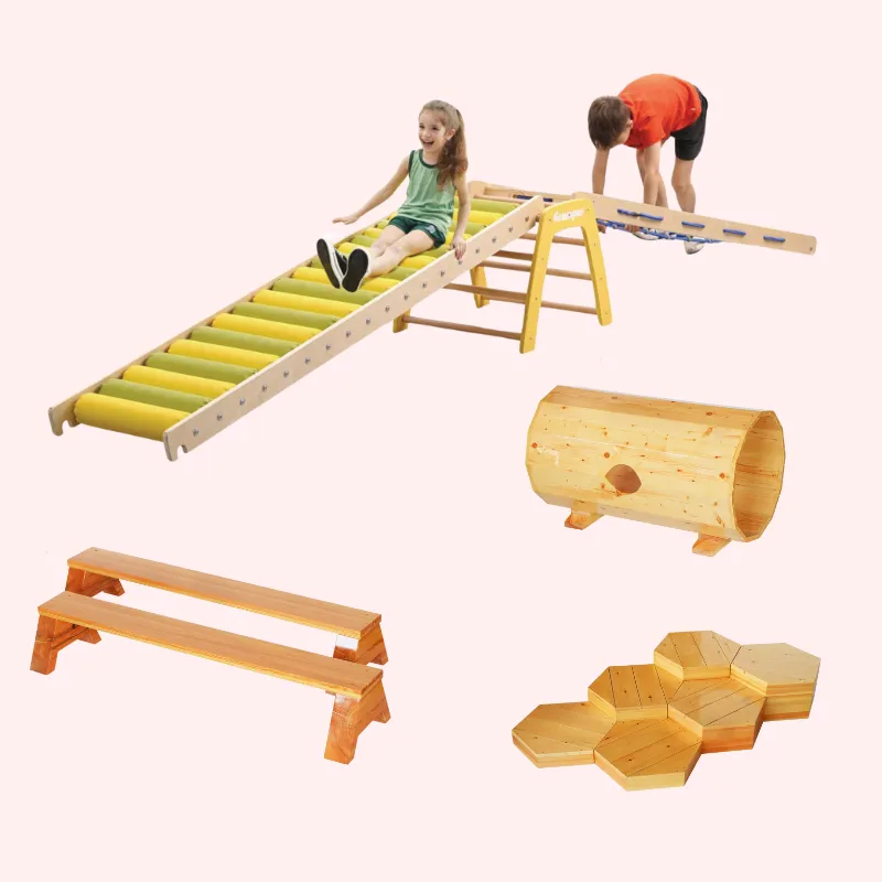 Children using wooden balance beams and textured stepping paths in a preschool outdoor play area to develop coordination and gross motor skills