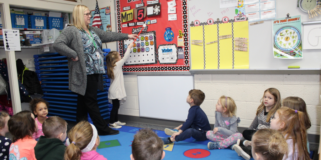 Preschool a Weather Reporter during circle time