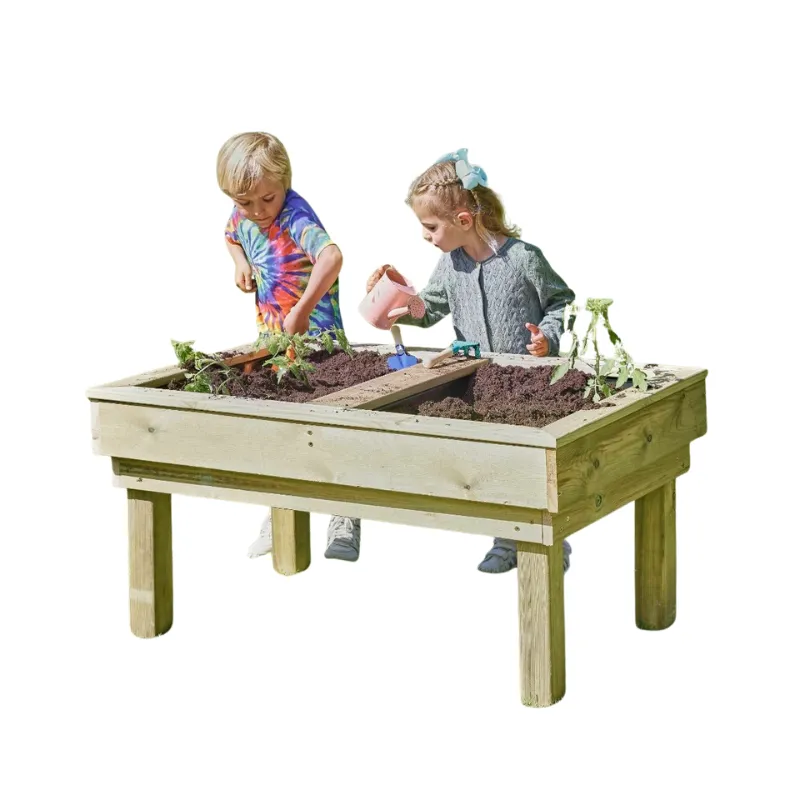Two children planting herbs in a raised wooden planter box for preschool outdoor gardening and nature-based learning