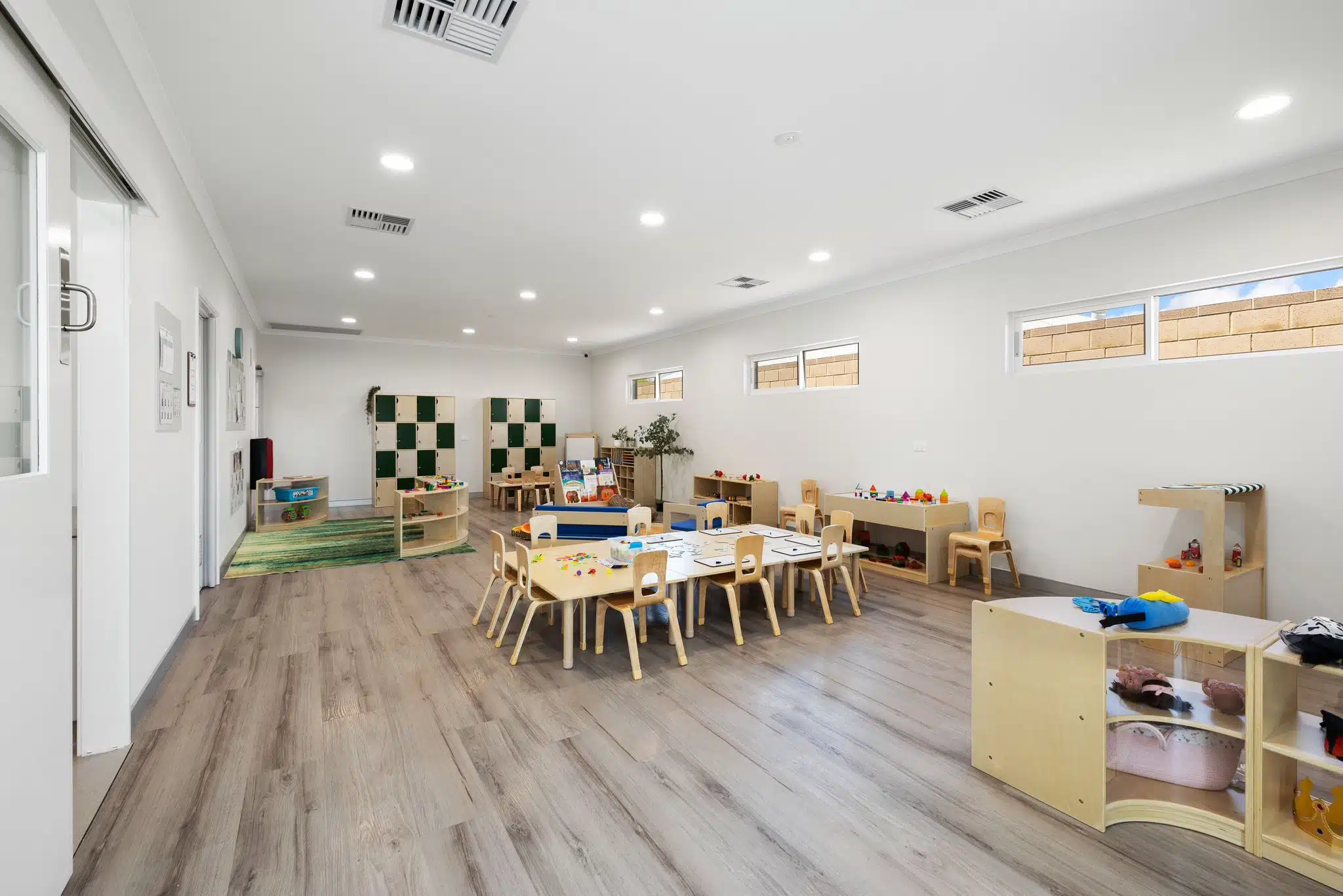 Ever Wood Early Education classroom with tables and chairs