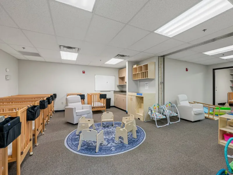 Crèche furniture including safe sleep cots, feeding stations and baby room essentials