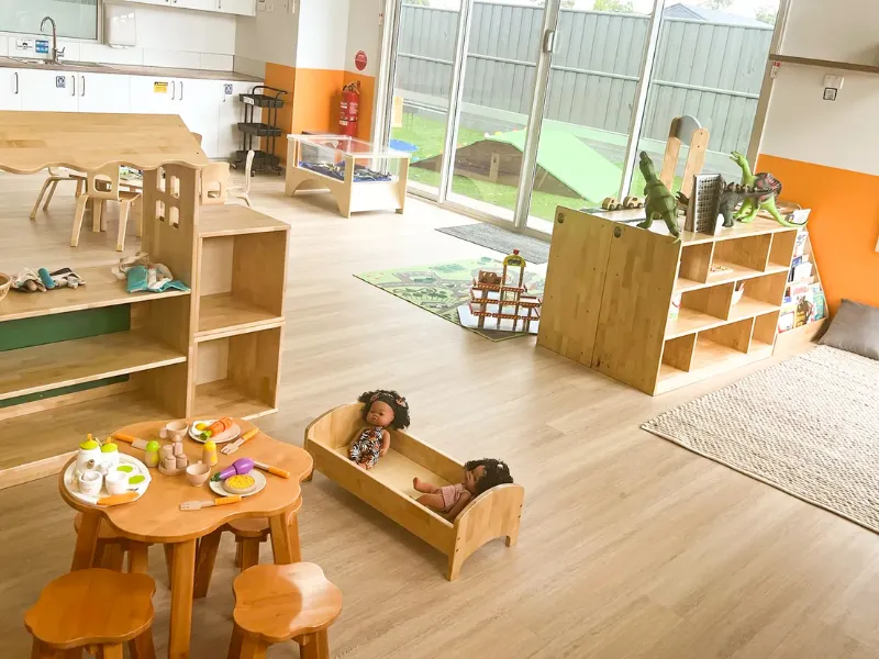 Children's art atelier with easels and creative materials in early years setting