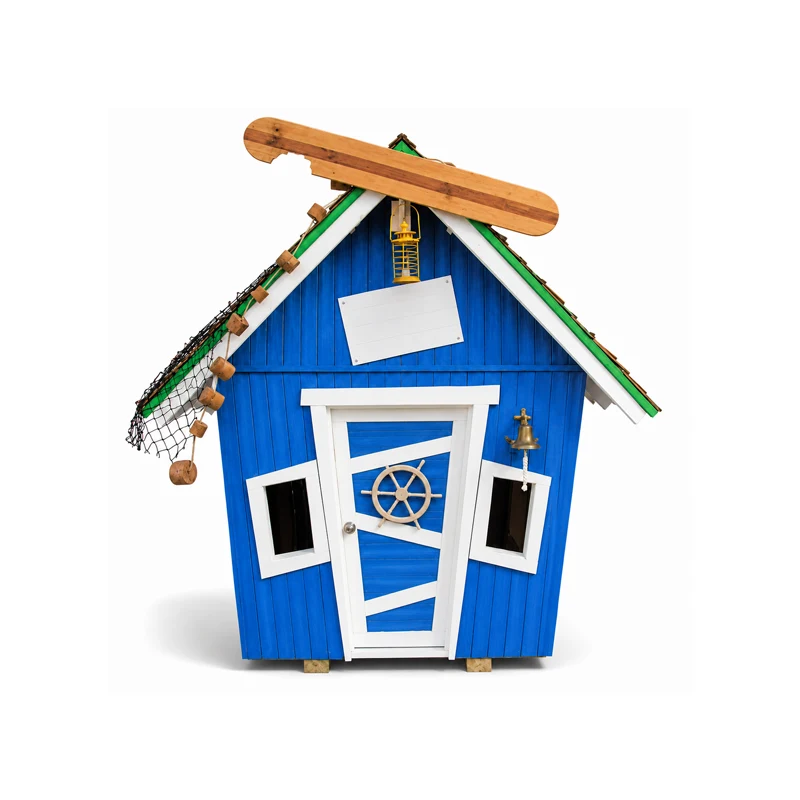 Whimsical nautical playhouse on white
