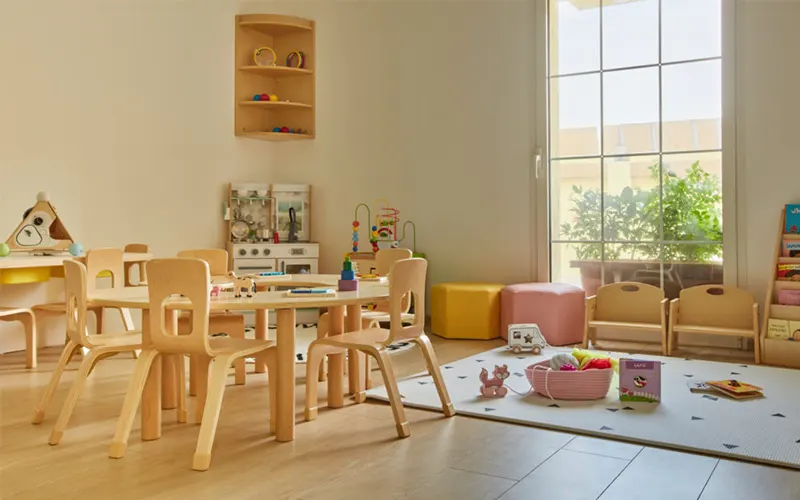 Preschool activity tables and chairs in a client classroom