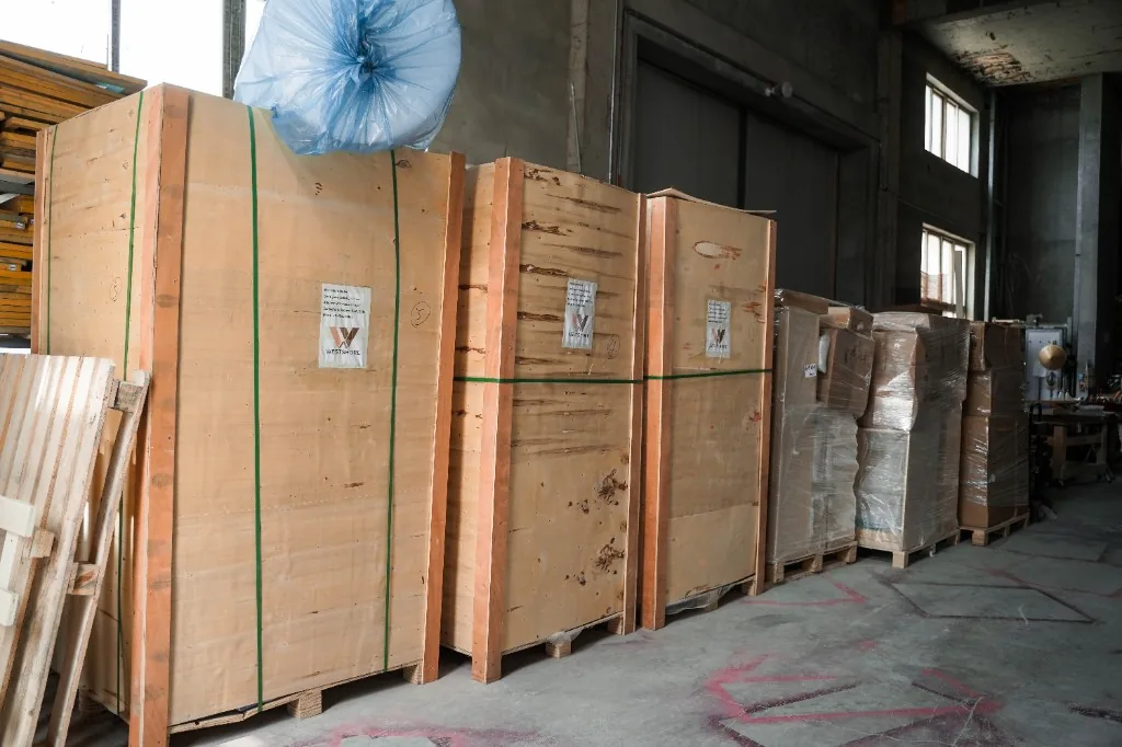 West Shore branded wooden export crates packed and lined up for the container