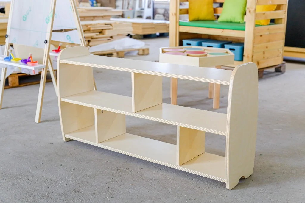 Child-height birch preschool bookshelf with staggered open cubbies