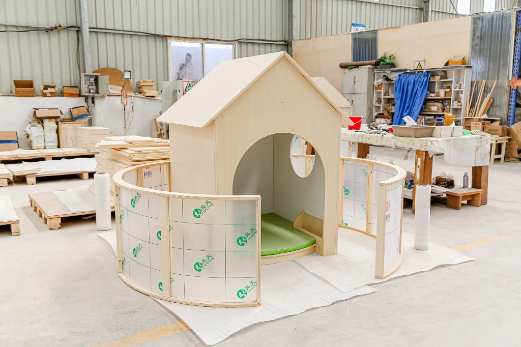Curved acrylic panel walls on a playhouse in West Shore factory